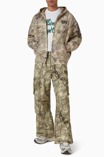 تي شيرت بياقة عالية ونقشة ماسات وعلامات دولار قطن