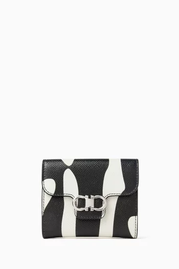 Gancini Bi-fold Wallet in Grained Leather
