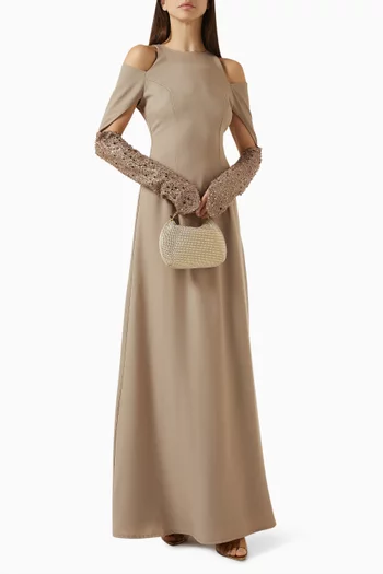 فستان مزين بفتحات وتطريزات كريب وتول