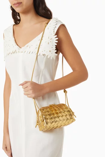 حقيبة كونسرت جلد لامع مجدول