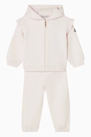 طقم جاكيت وبنطال رياضي بشعار الماركة