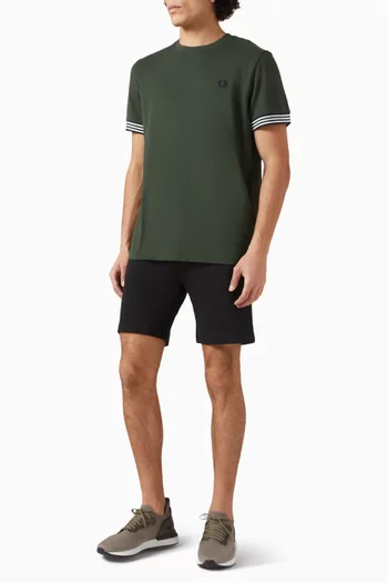 تي شيرت بخطوط على حواف الأكمام قطن بيكيه