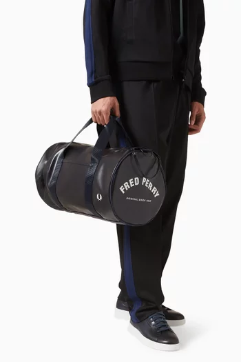 حقيبة اسطوانية كلاسيكية بإضافات بلون مماثل