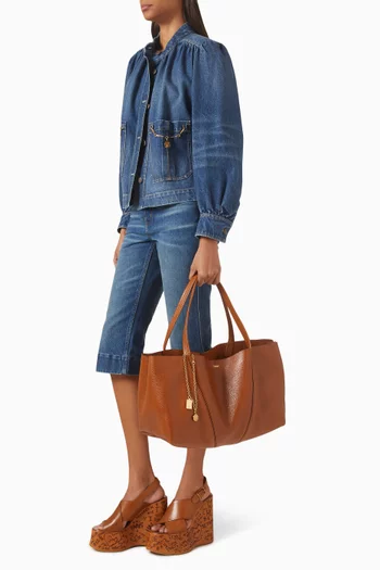 حقيبة يد سبين إيست ويست كبيرة جلد عجل حبيبي لامع