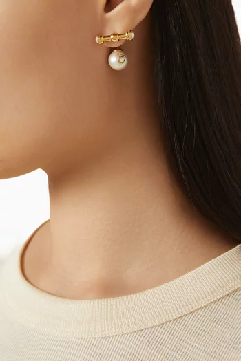 أقراط متدلية مزينة بلؤلؤ نحاس