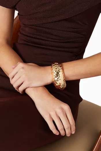 سوار بتصميم مطروق نحاس مطلي بلون ذهبي