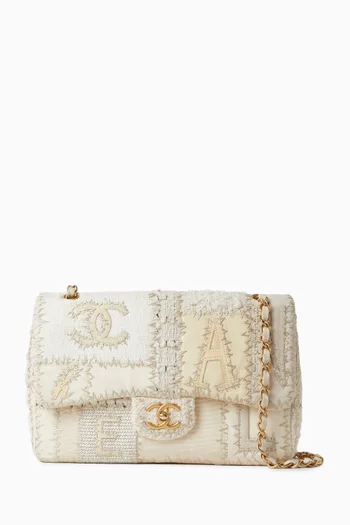 حقيبة جامبو بغطاء قلاب ورقعات بارزة من عقد 2010