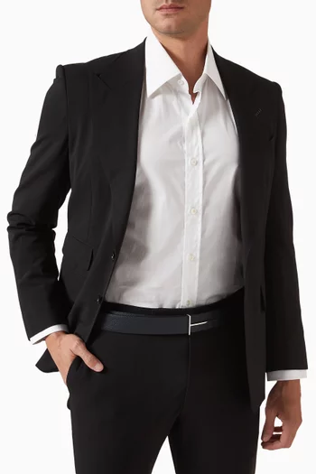 حزام بوجهين وحرف T الشهير جلد