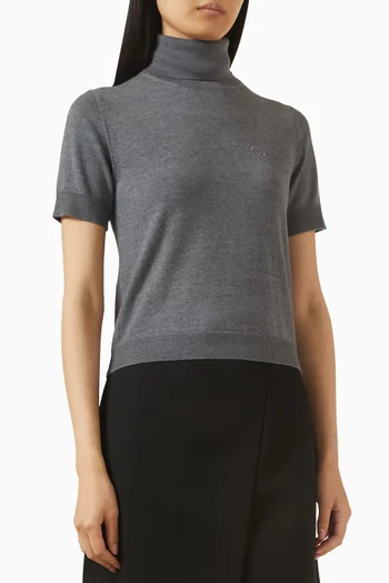 سترة بياقة عالية ومطرزة بشعار الماركة صوف