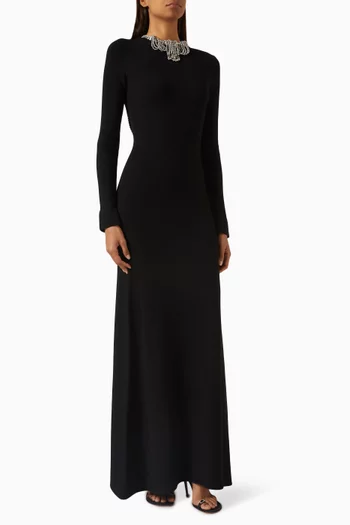 فستان بظهر مكشوف مرصع بالأحجار