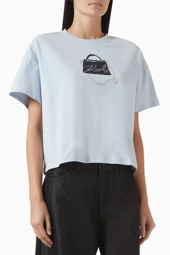 تي شيرت بطبعة حقيبة وشعار الماركة قطن عضوي