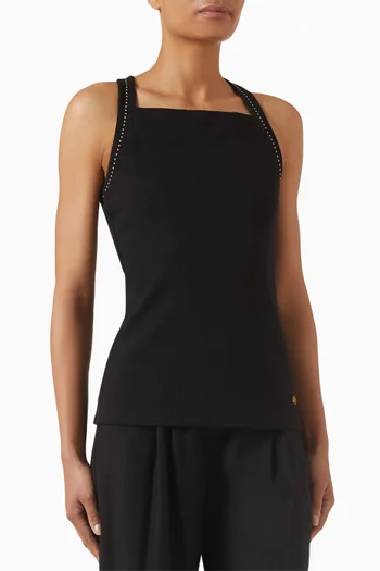 بلوزة بلا أكمام مطرزة بحلي معدنية صغيرة