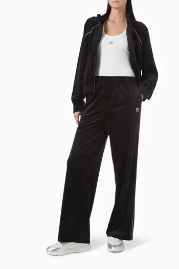 بلوزة بلا أكمام بحلية معدنية بشعار الماركة مزيج قطن عضوي ومضلع