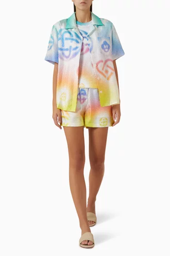 تي شيرت بنقشة شعار الماركة باهتة قطن