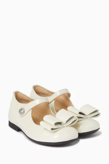 حذاء باليرينا بعقدة وكعب مسطح جلد