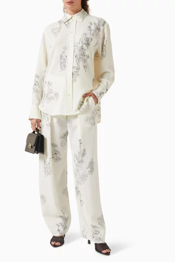 بنطال واسع الساقين بنقشة زهور فيسكوز