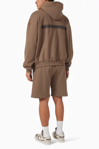 كنزة بغطاء رأس فضفاضة وشعار الماركة قطن