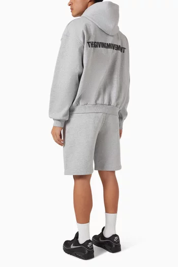 كنزة بغطاء رأس فضفاضة وشعار الماركة قطن