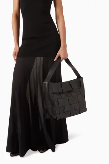 حقيبة يد كبيرة بتصميم مجدول جلد