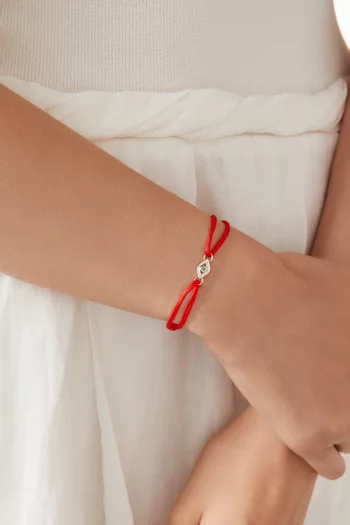 سوار بتصميم حبل بحلية عين الحسود مرصعة بالزمرد ذهب عيار 14