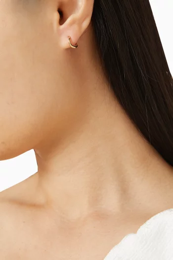 أقراط هاجي بتصميم مموج ذهب أصفر عيار 14