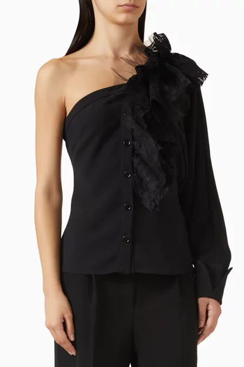 بلوزة بكشكش وفتحة رقبة بكتف مكشوف