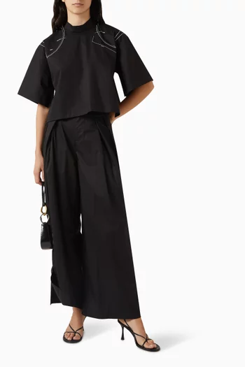 بنطال بحواف مطوية