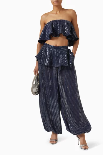 بنطال بخصر على شكل جرس ومطرز بالترتر