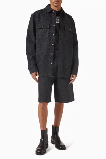 قميص بنقشة أحرف الماركة محفورة بالليزر دينم