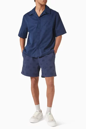 قميص بنقشة شعار الماركة قطن