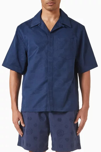 قميص بنقشة شعار الماركة قطن