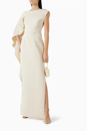 فستان مزين بتطريزات بالخرز