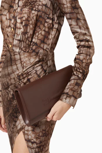 كلاتش بشعار الماركة البارز جلد