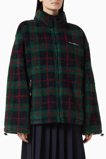 جاكيت بقصة فضفاضة بسحّاب ونقشة مربعات تيدي