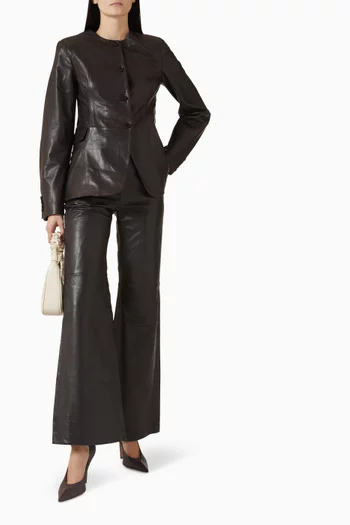 بنطال بقصة واسعة جلد