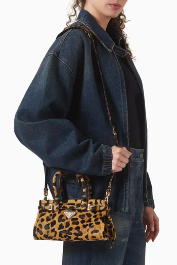 حقيبة بوني ميني شمواه جلد عجل بنقشة جلد الفهد