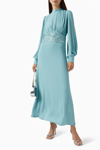 فستان طويل بحزام مزين بتطريزات بالترتر