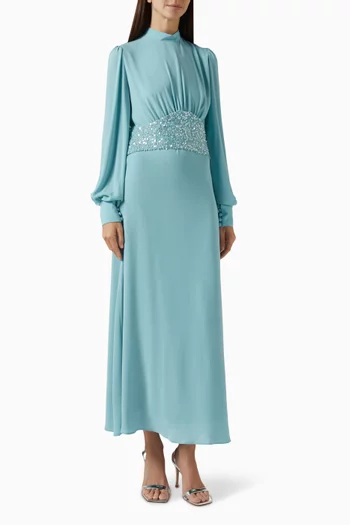 فستان طويل بحزام مزين بتطريزات بالترتر