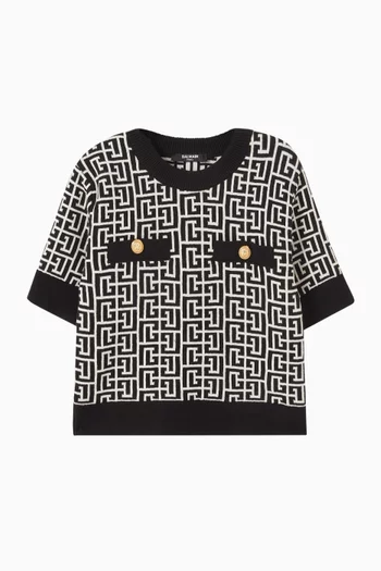 بلوزة منسوجة ونقشة شعار الماركة