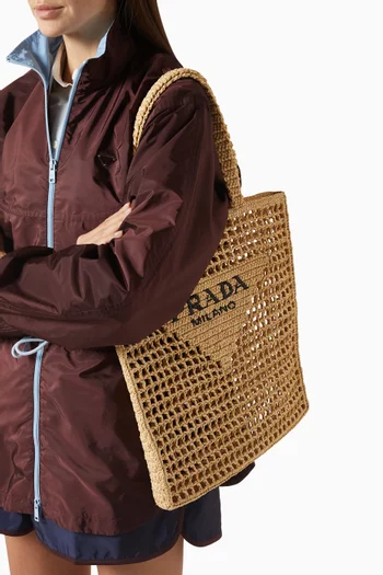 حقيبة يد بشعار الماركة كروشيه