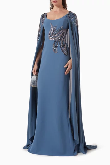 فستان مزين بتطريزات بالخرز