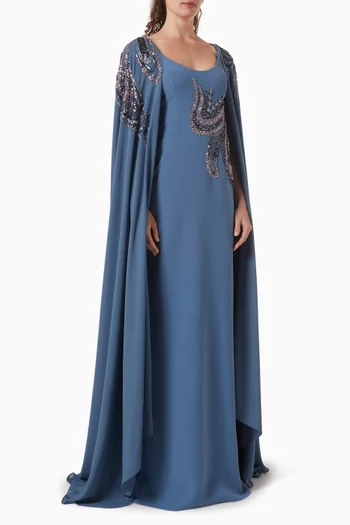 فستان مزين بتطريزات بالخرز