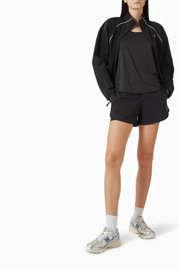 بلوزة ار سي إسنشيل بلا أكمام