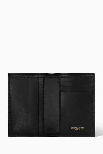 محفظة صغيرة بفتحات للبطاقات وشعار كاسندر جلد