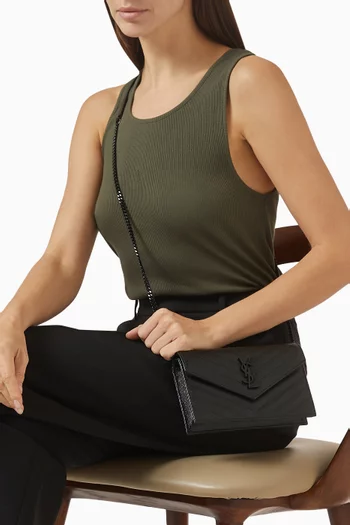 حقيبة كاساندر بتصميم ظرف مبطّن وسلسلة جلد