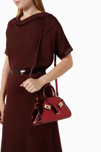 Mini Hug Top-handle Bag in Metallic Leather