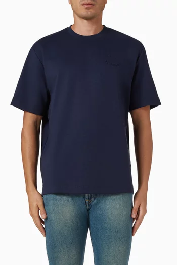 تي شيرت بشعار وجه يبتسم بارز الملمس قطن