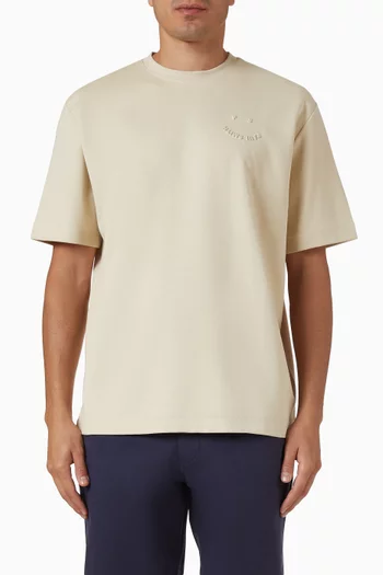 تي شيرت بشعار وجه يبتسم بارز الملمس قطن