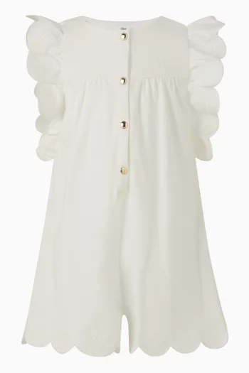 رومبر بتصميم بلا أكمام وكشكش وأزرار