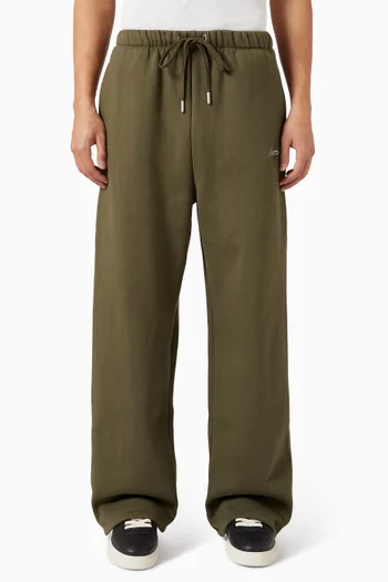 بنطال رياضي بقصة ساق واسعة وشعار الماركة مزيج قطن